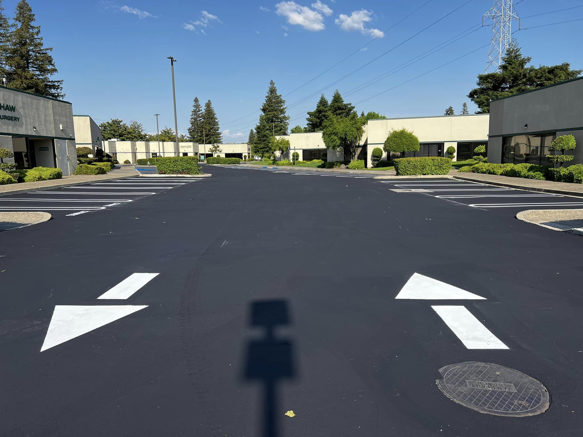 Painting Number Stencils on Parking Lot Pavement