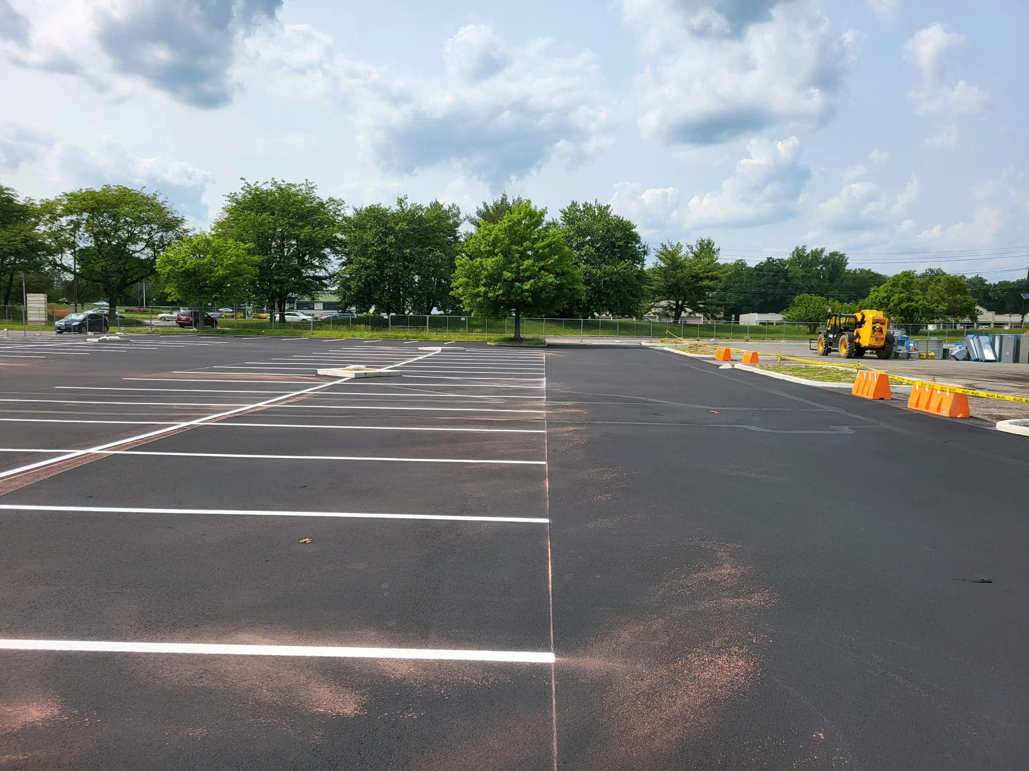 Painting Number Stencils on Parking Lot Pavement
