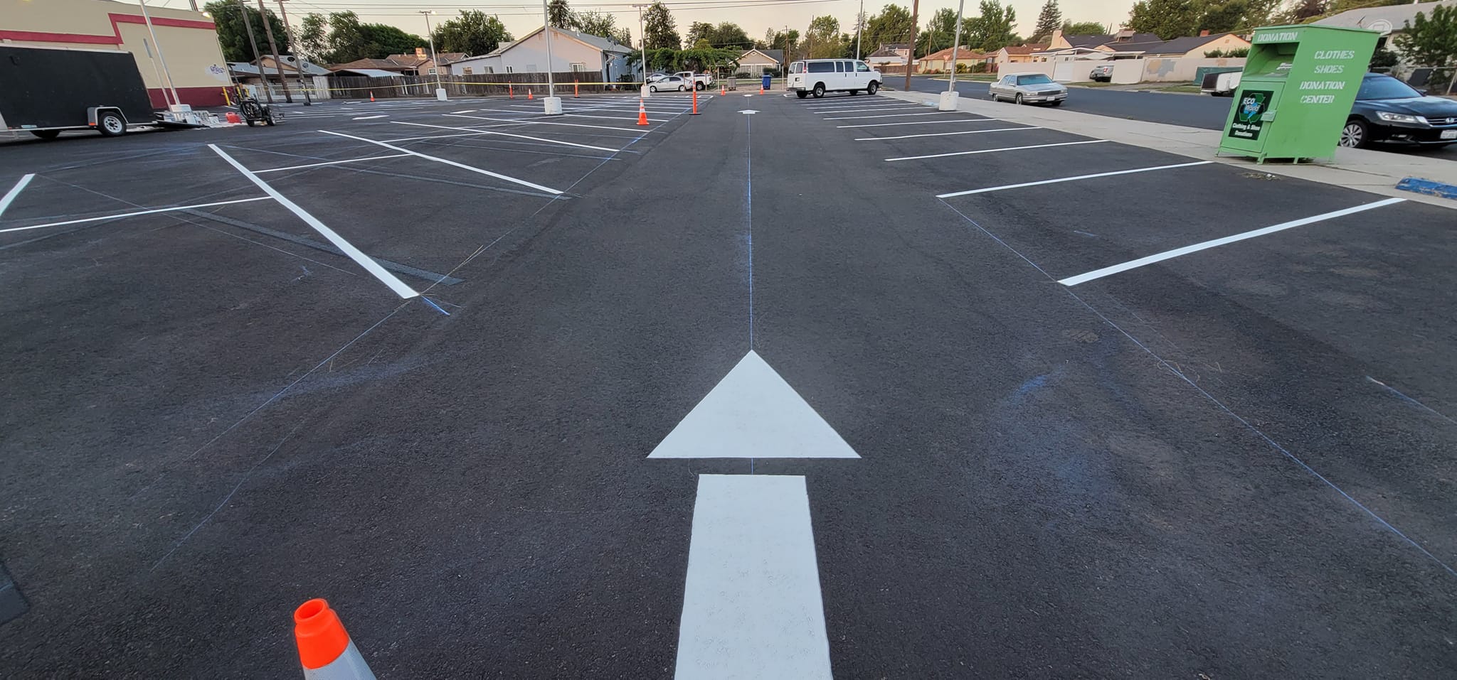 Painting Number Stencils on Parking Lot Pavement